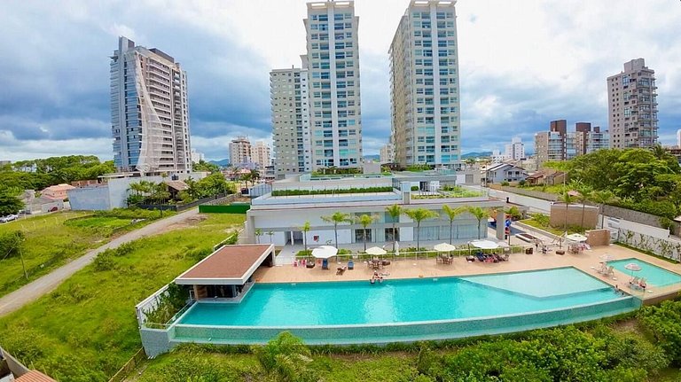 Apto luxo Summer Home Club | Frente mar + cinema